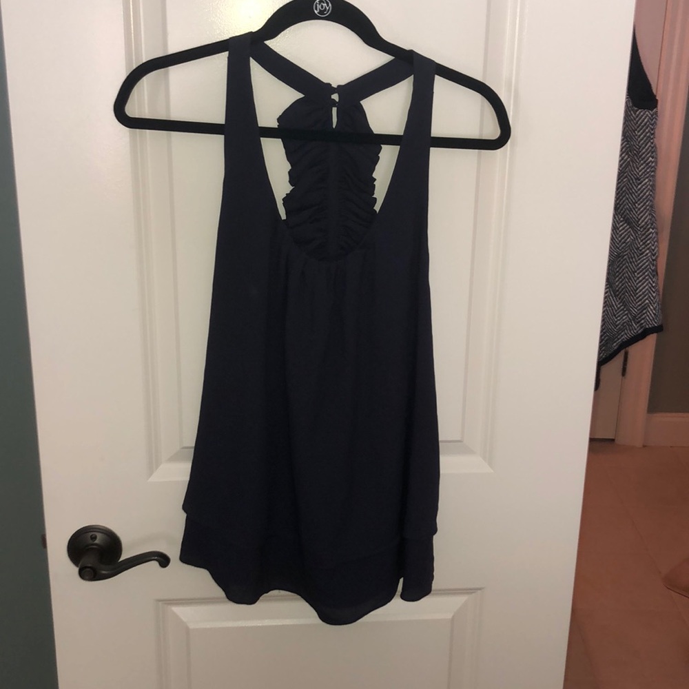 Lush ruffled back going out top